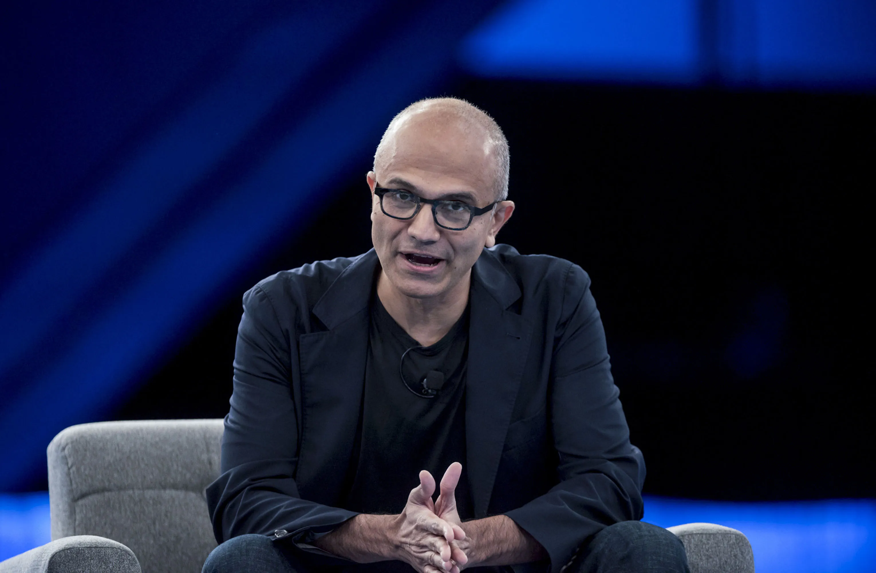 Satya Nadella, chief executive officer of Microsoft Corp., speaks during a conversation at the DreamForce Conference in San Francisco, California, U.S., on Wednesday, Sept. 16, 2015.
