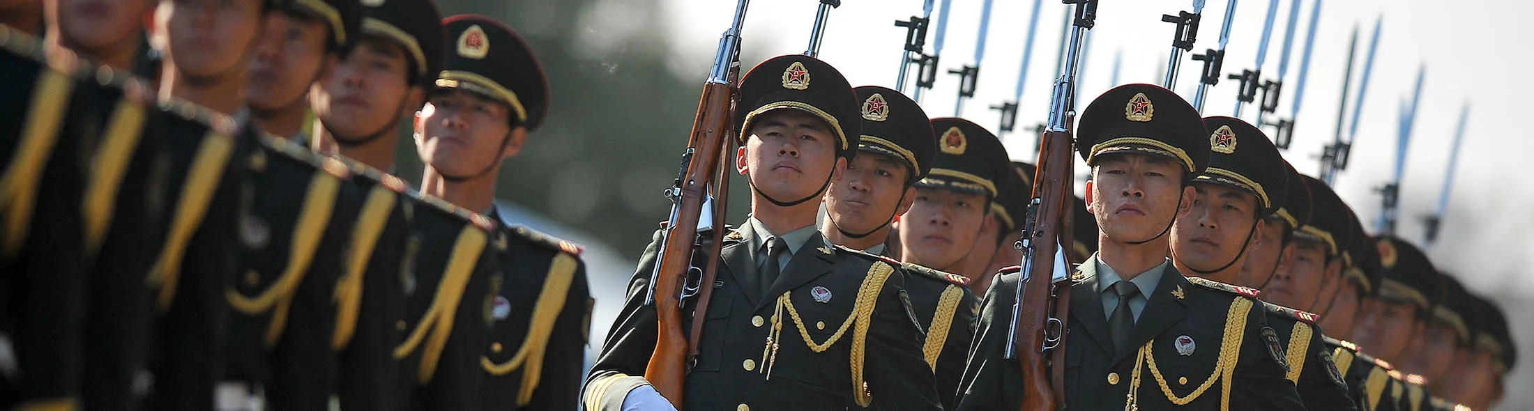 Chinese honour guards prepare for the arrivial of India's Prime Minister Manmohan Singh and Chinese premier Li Keqiang outside the Great Hall of the People in Beijing on October 23, 2013. Manmohan Singh is on a visit to China from October 22 to 24. AFP PHOTO / WANG ZHAO (Photo credit should read WANG ZHAO/AFP/Getty Images)
