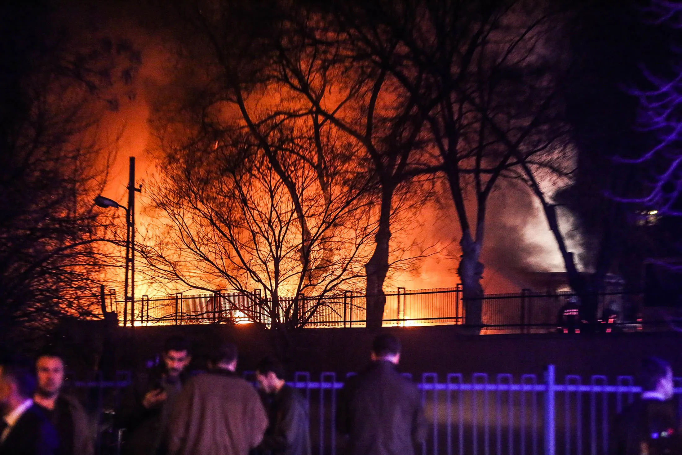Turkish army service busses burn after an explosion on Feb. 17, in Ankara, Turkey.
