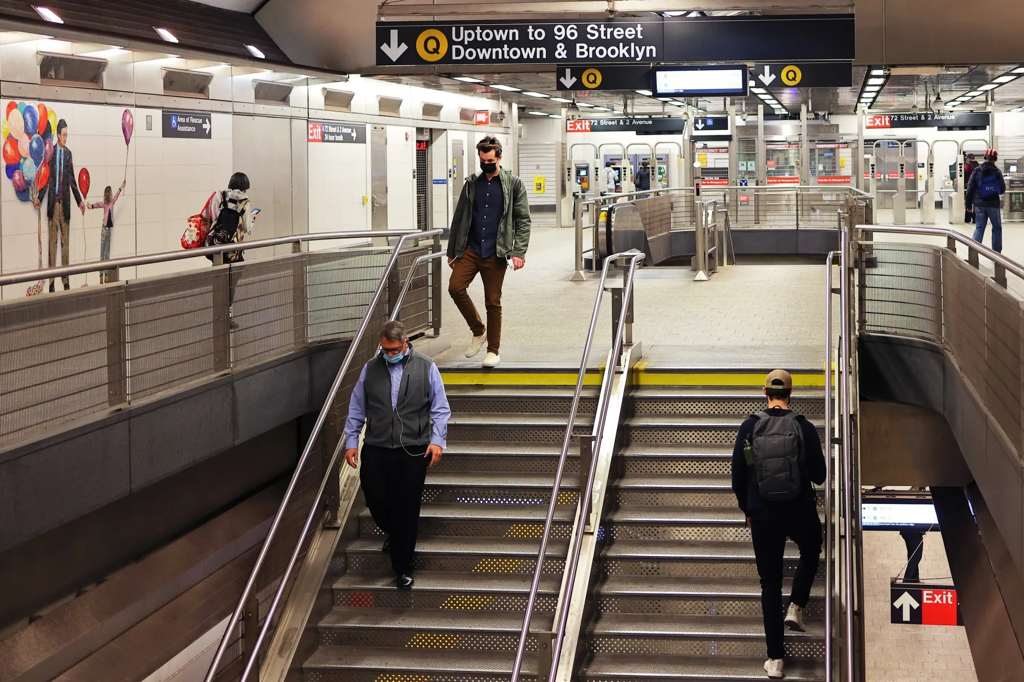 People walk along the the Second Avenue subway station in 2021.&nbsp;