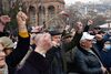 Armenian opposition supporters rally to demand the resignation of the prime minister in Yerevan on March 10.