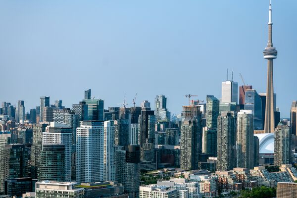 Residential And Commercial Buildings In Toronto Ahead Of GDP Figures 