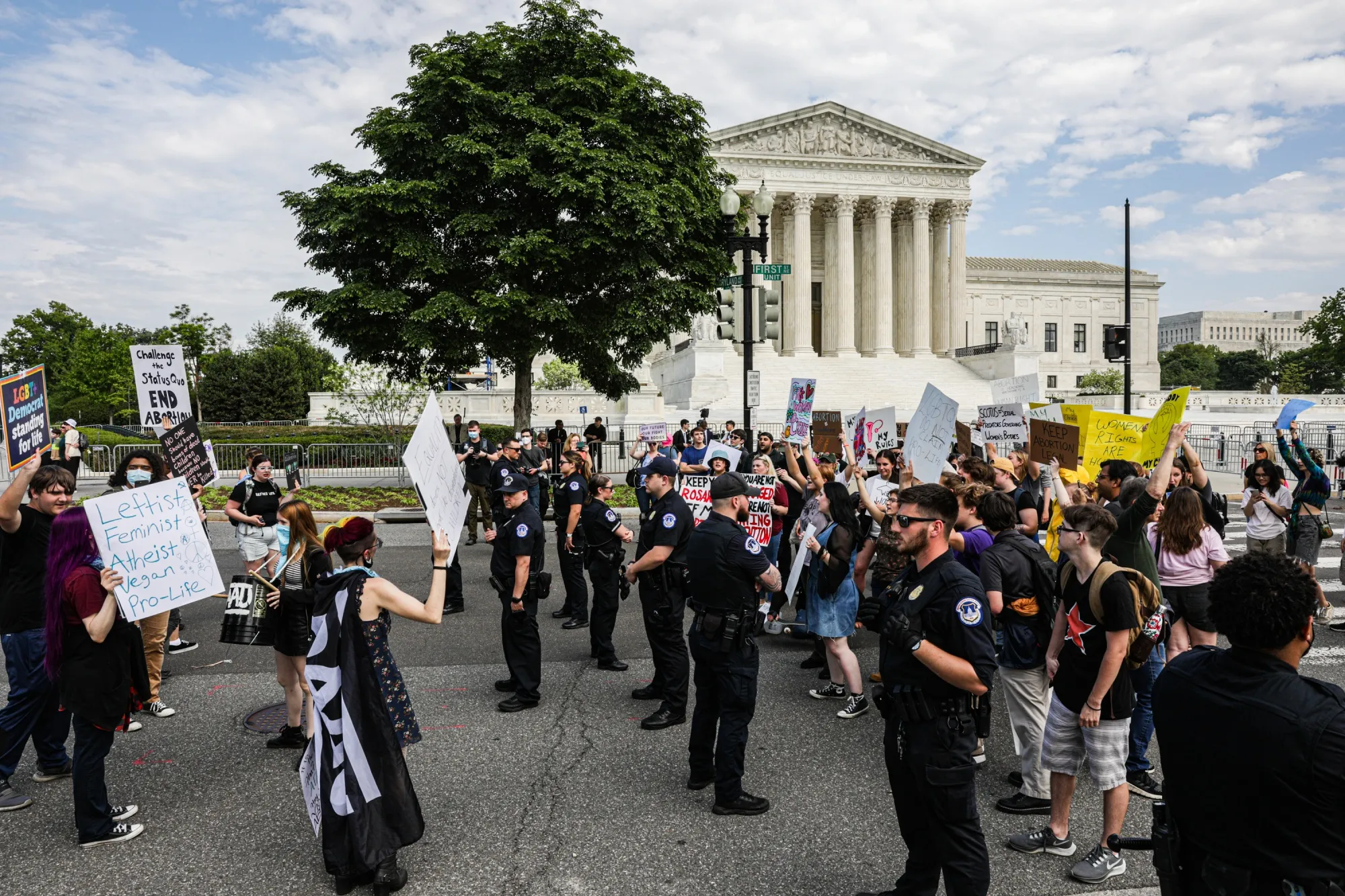 Police officers separate demonstrators outside the U.S. Supreme Court in Washington&nbsp;on&nbsp;May 4.