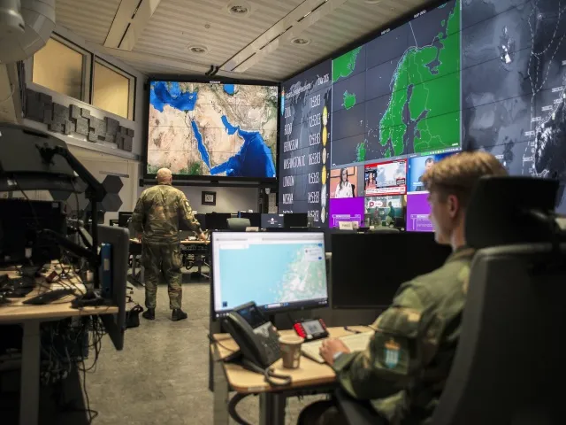 The Joint Operation Centre at the Norwegian Joint Headquarters has all the things you’d want in a submarine-tracking command center: buried in a mountain, wall-sized maps and soldiers staring intently at computers.
