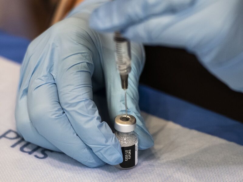 Vaccine-Givers Race Time at an Atlantic City Convention Hall