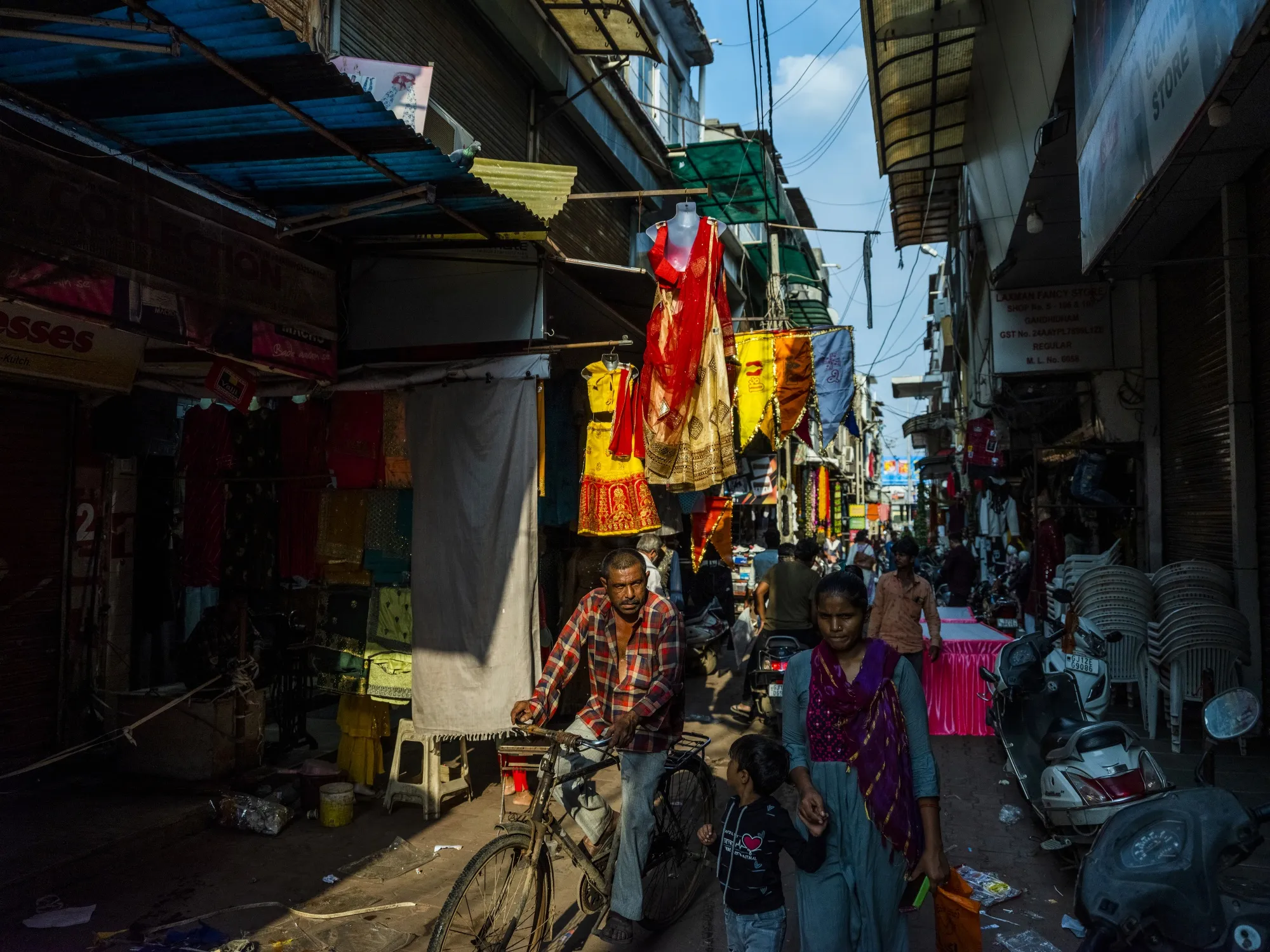 People shop in the main market area in Gandhidham, India.