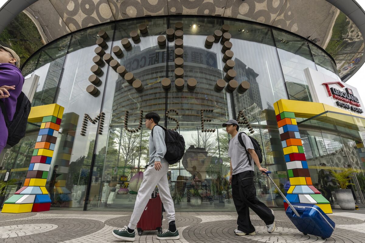 🟪"Il Sviluppatore di Hong Kong: Un Elemento di Disturbo nella Mega Trattativa per un Prestito"