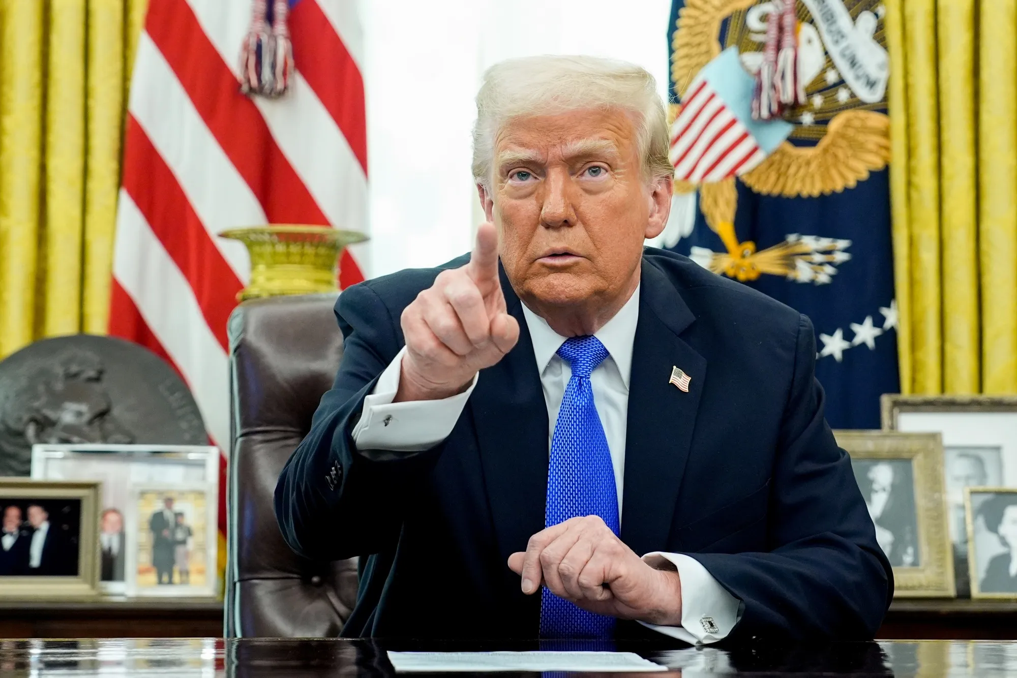 US President Donald Trump speaks in the Oval Office on Friday.