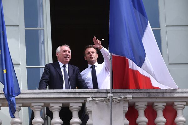 Emmanuel Macron, right, and Francois Bayrou  in Pau, France, in 2023.