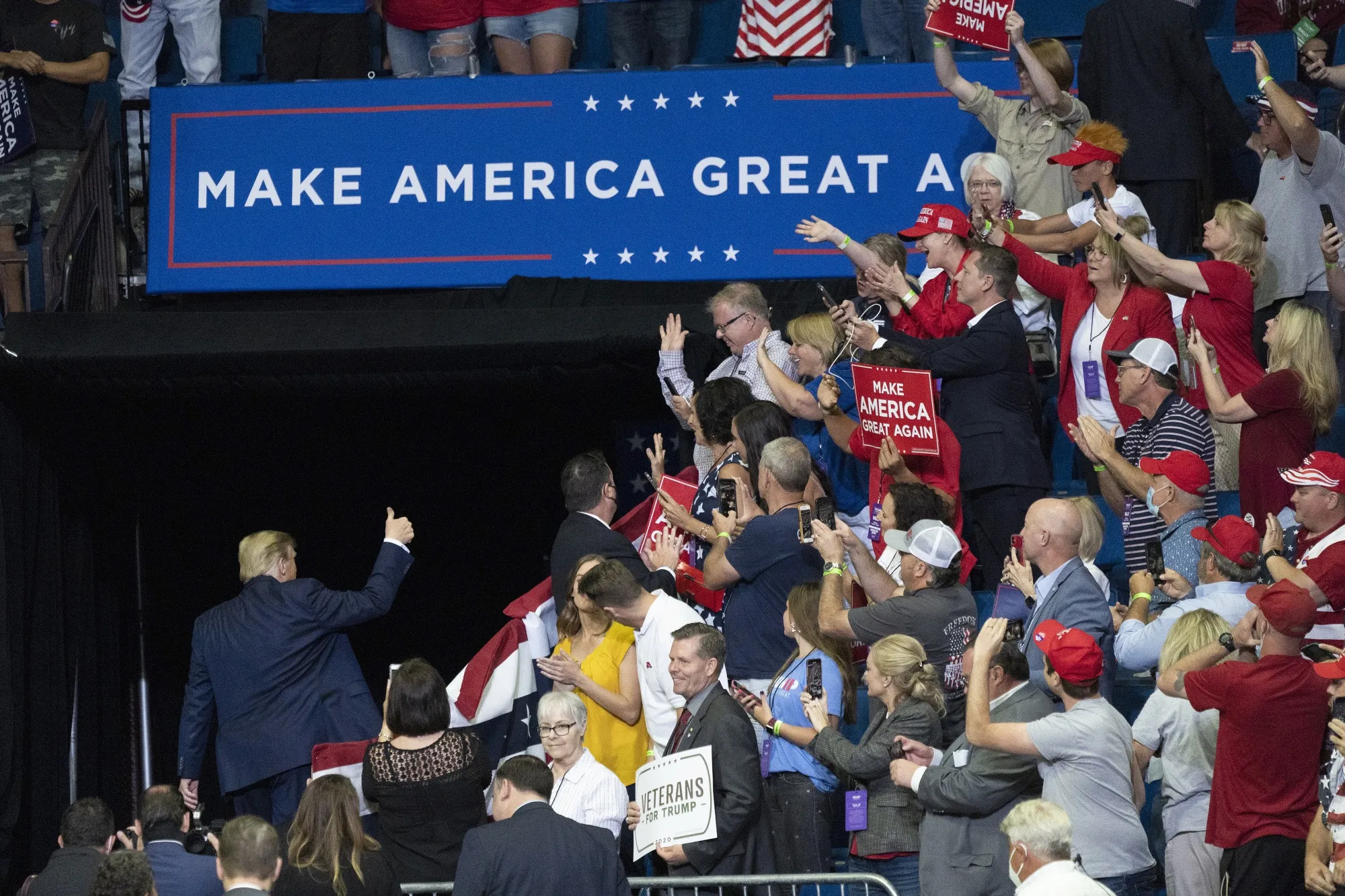 Donald Trump gestures a thumbs up as he leaves a rally in Tulsa, Oklahoma, on June 20.