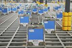 Kroger is opening robot-run fulfillment centers, like this one in Monroe, Ohio, to speed up online grocery deliveries.