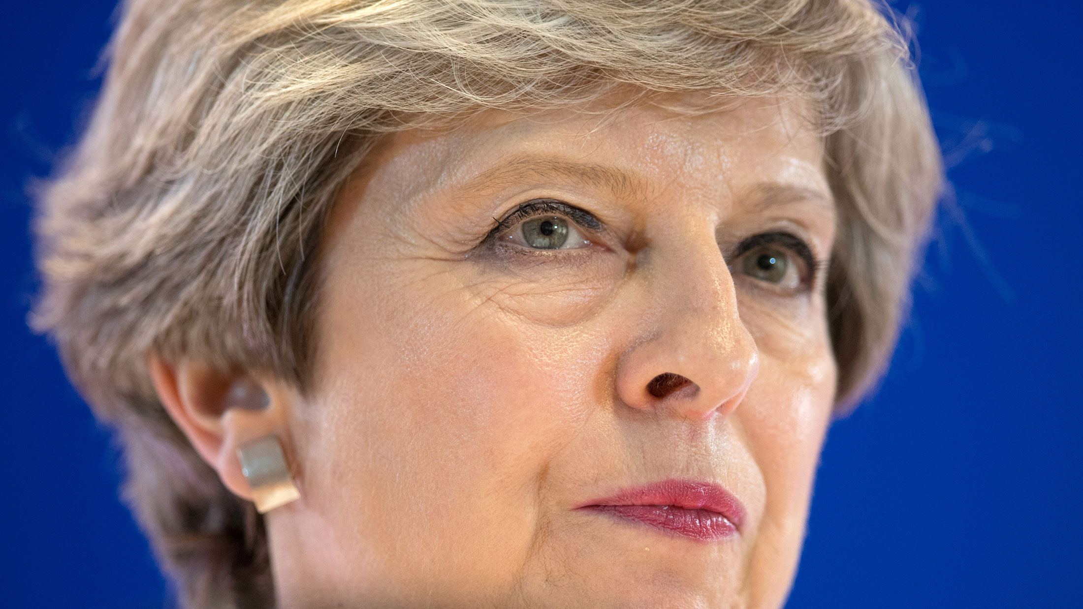 Theresa May, U.K. prime minister, pauses during a news conference in Brussels on June 23, 2017.
