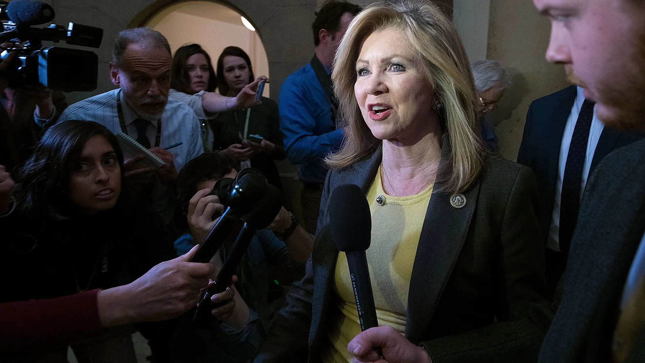 Representative Marsha Blackburn is surrounded by reporters after leaving the office of Speaker Paul Ryan on March 23, 2017, in Washington.
