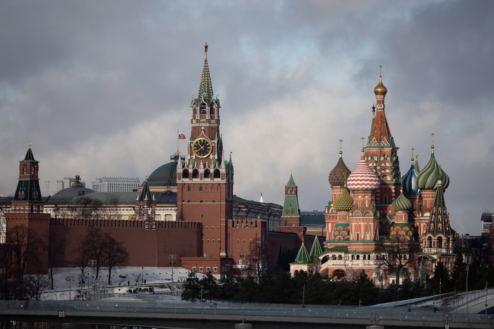 The Spasskaya tower of the Kremlin, center, and Saint Basil's Cathedral, right, in Moscow.
