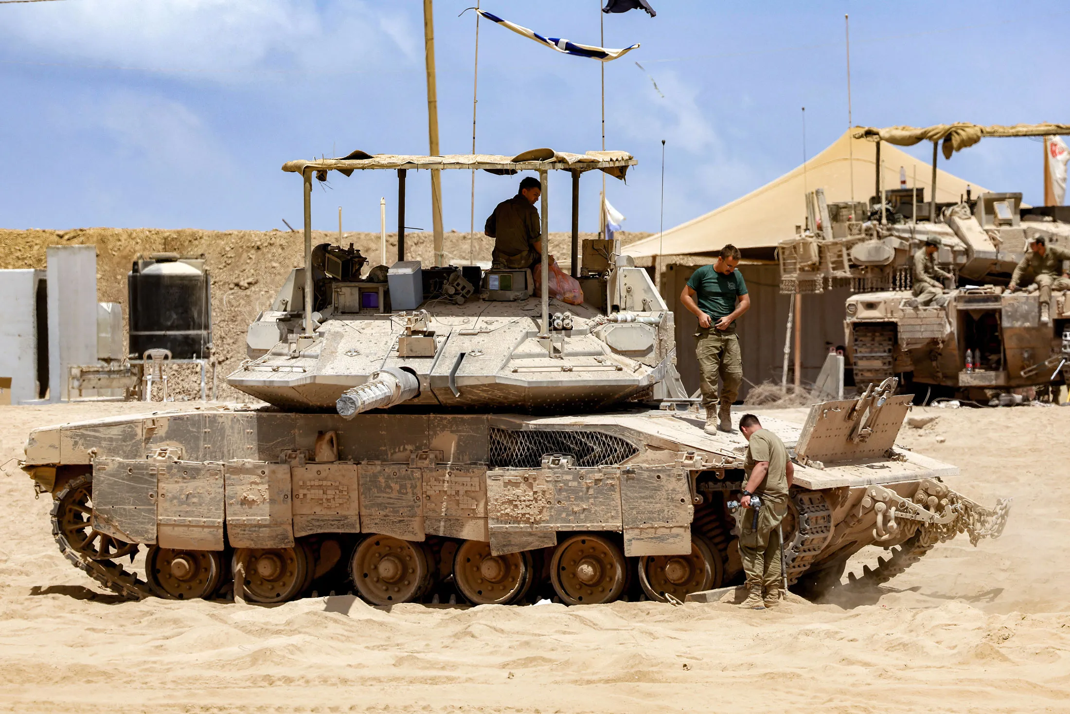 Israeli soldiers and tanks positioned near the border with Gaza on Aug. 5.