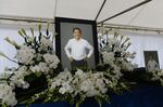 A photograph of Shinzo Abe at a makeshift memorial at Zojoji temple in Tokyo on July 12.