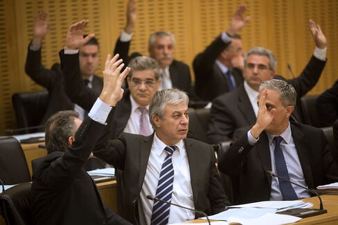 Cyprus Said to Reach Tentative Deal to Avert Default, Euro Exit
