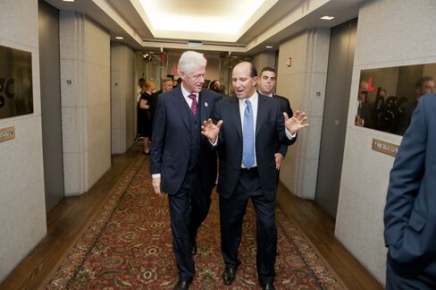 Howard Lutnick and Bill Clinton