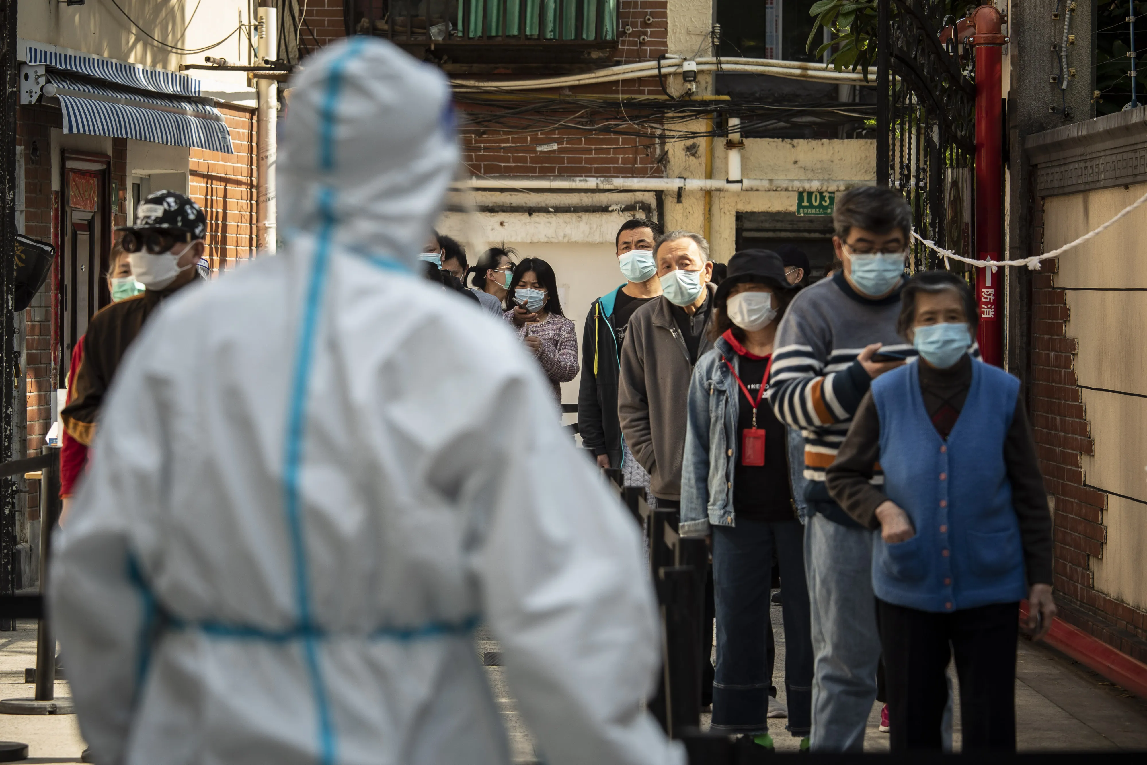 Residents take part in a round of Covid-19 testing during a lockdown in Shanghai, China, on&nbsp;April 18.