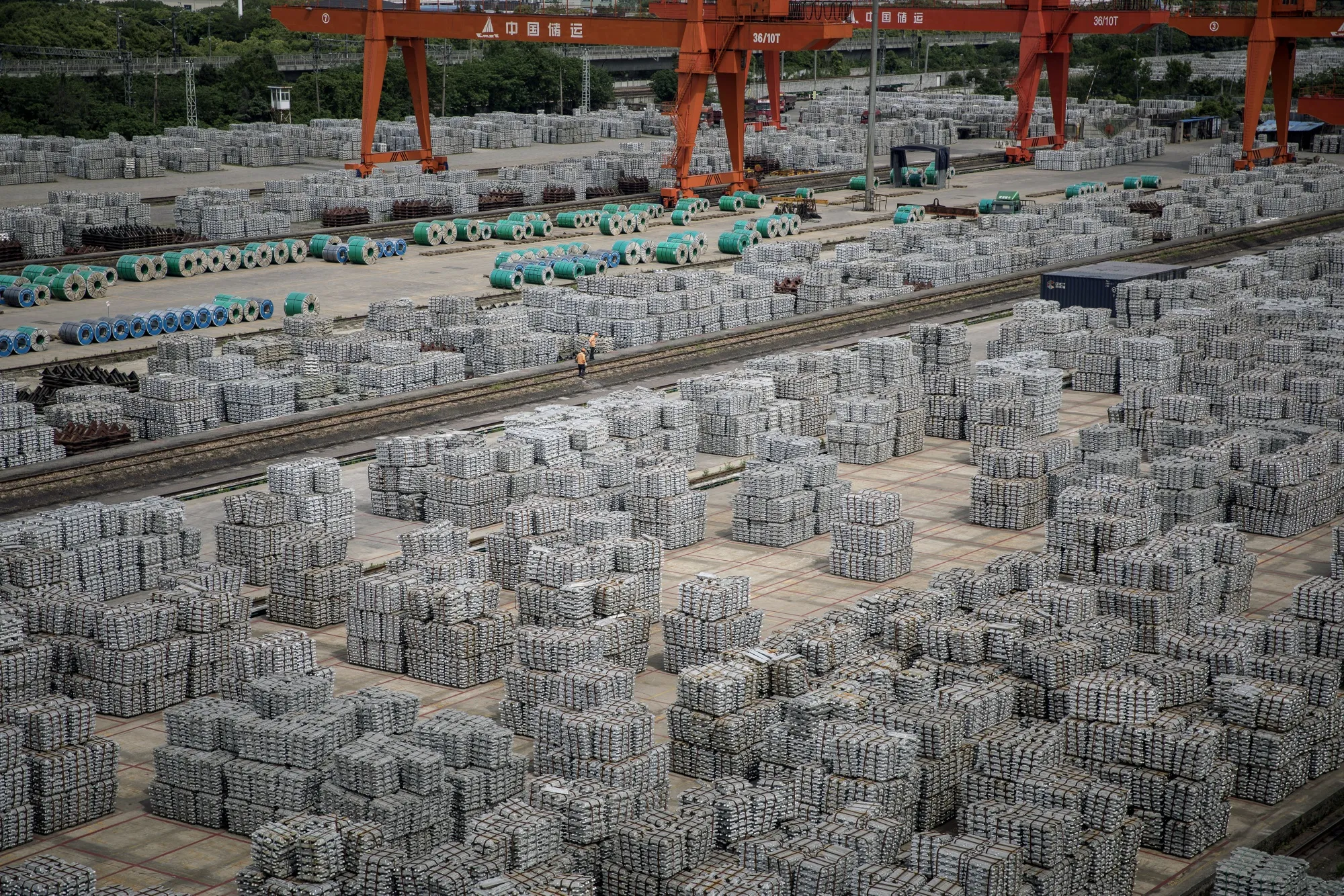 Aluminum Stockpiles at a Depot as China's Trade Shows Economic Recovery Tested by Global Slowdown
