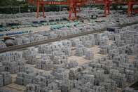 Aluminum Stockpiles at a Depot as China's Trade Shows Economic Recovery Tested by Global Slowdown