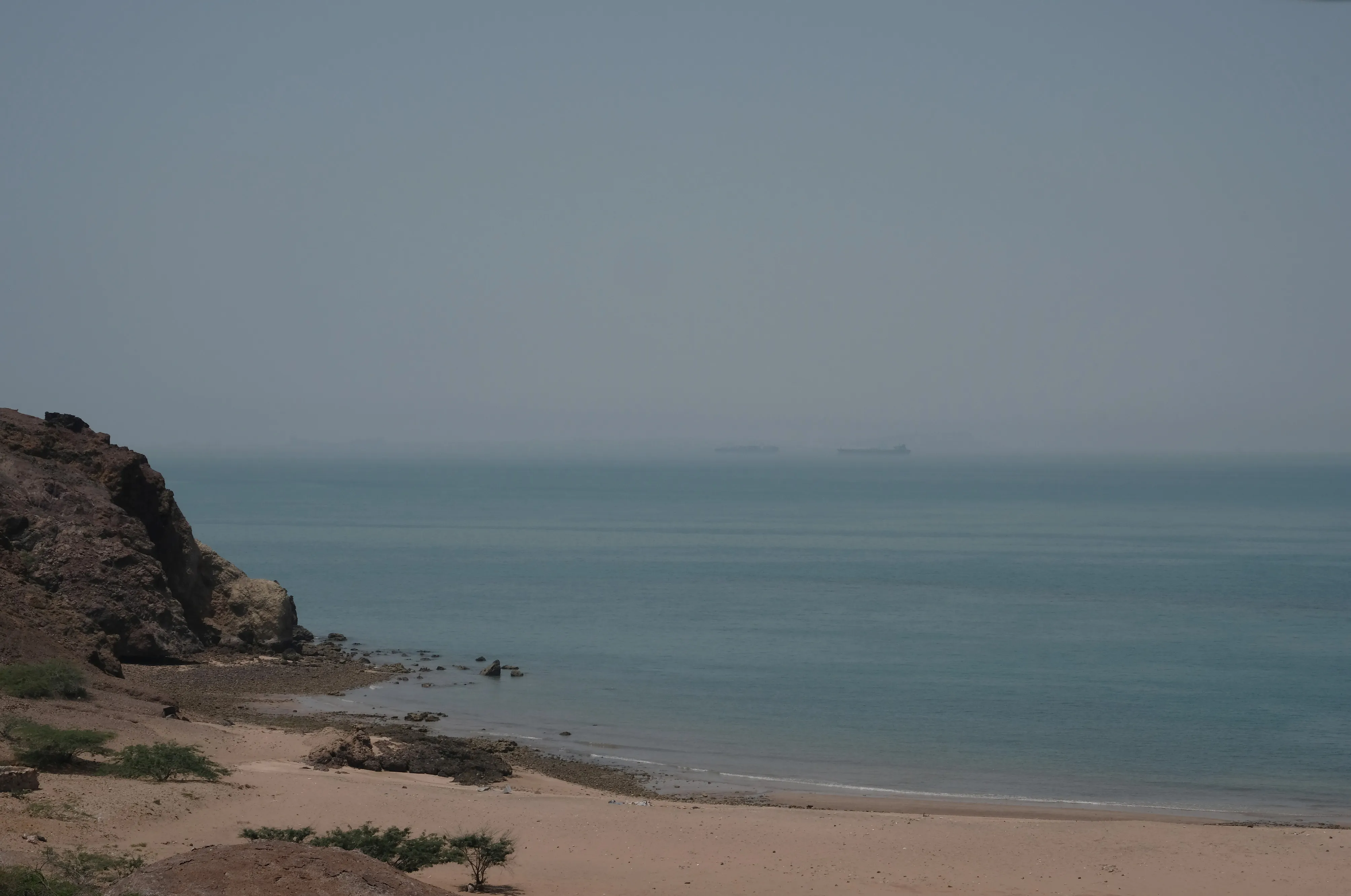 Two oil tankers are seen at a distance in the waters of Strait of Hormuz&nbsp;in Hormuz Island, Iran.