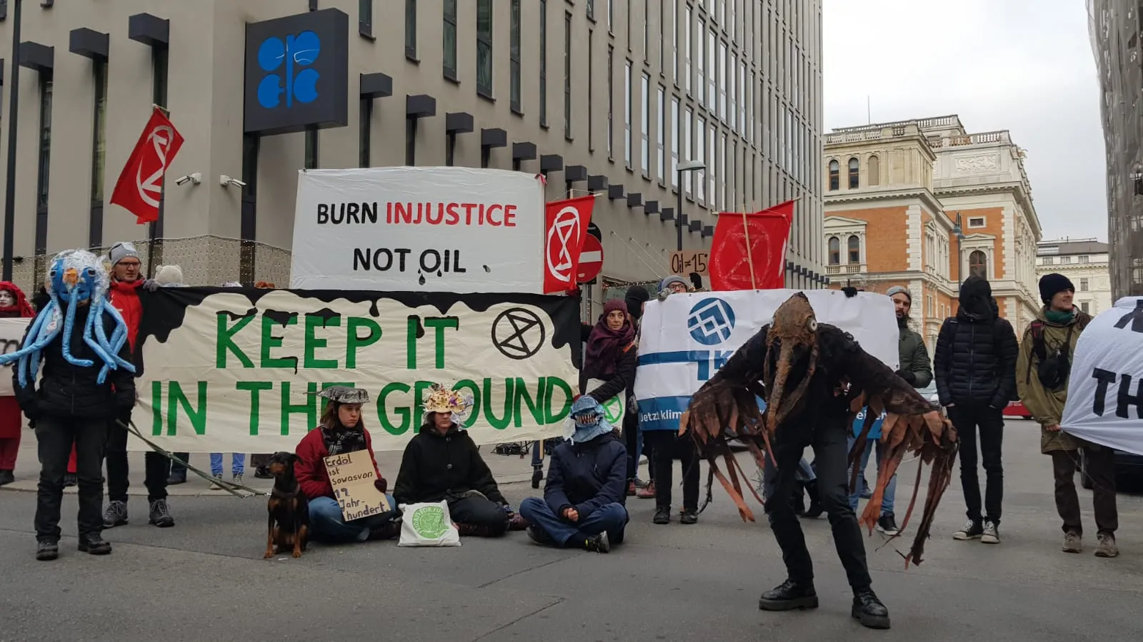 Anti-oil protestors demonstrate outside OPEC