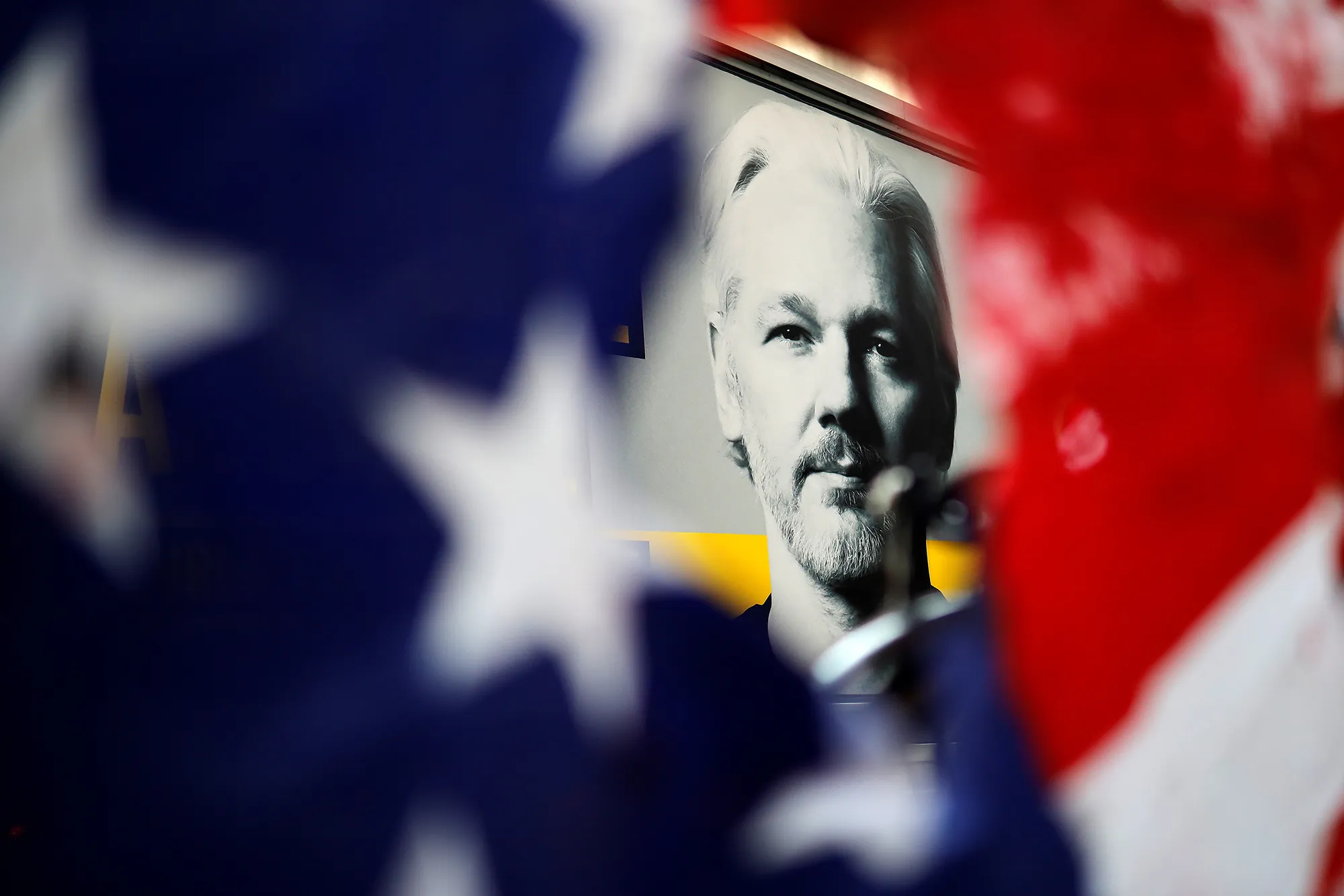 A portrait of Julian Assange during a demonstration in London.