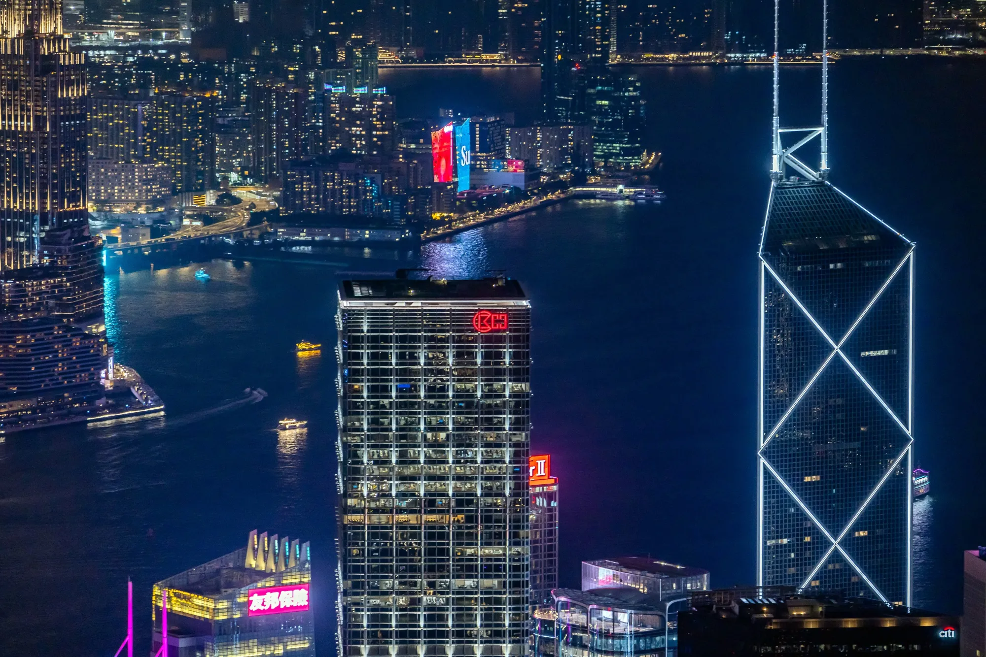 Cheung Kong Center building, which houses the headquarters of CK Hutchison Holdings Ltd. and CK Asset Holdings Ltd., center, in Hong Kong.