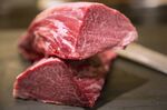 Pieces of Wagyu beef sits on a table at a members only restaurant in Tokyo, Japan.