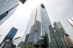 A South Korean flag, left, and Samsung Electronics Co. flag fly outside the company's headquarters in Seoul, South Korea.