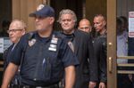 Steve Bannon exits Manhattan State Supreme Court in New York, on Sept. 8.