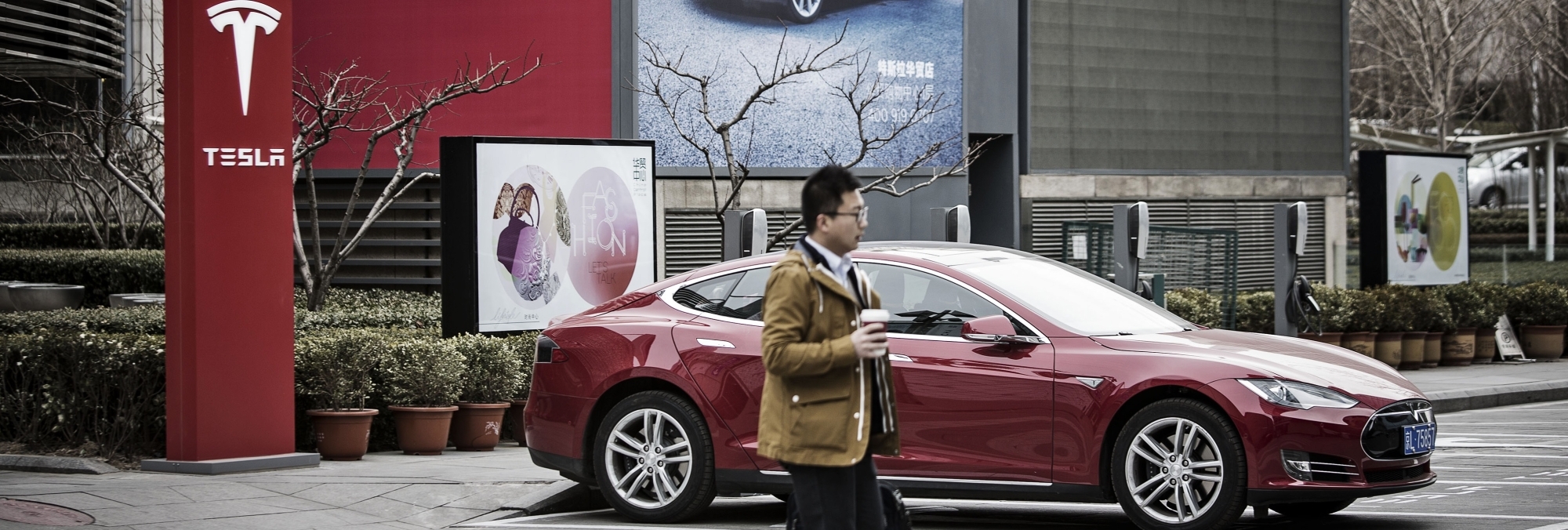 A&nbsp;Tesla&nbsp;Model S&nbsp;at one of the company's electric charging stations near a shopping mall in Beijing.