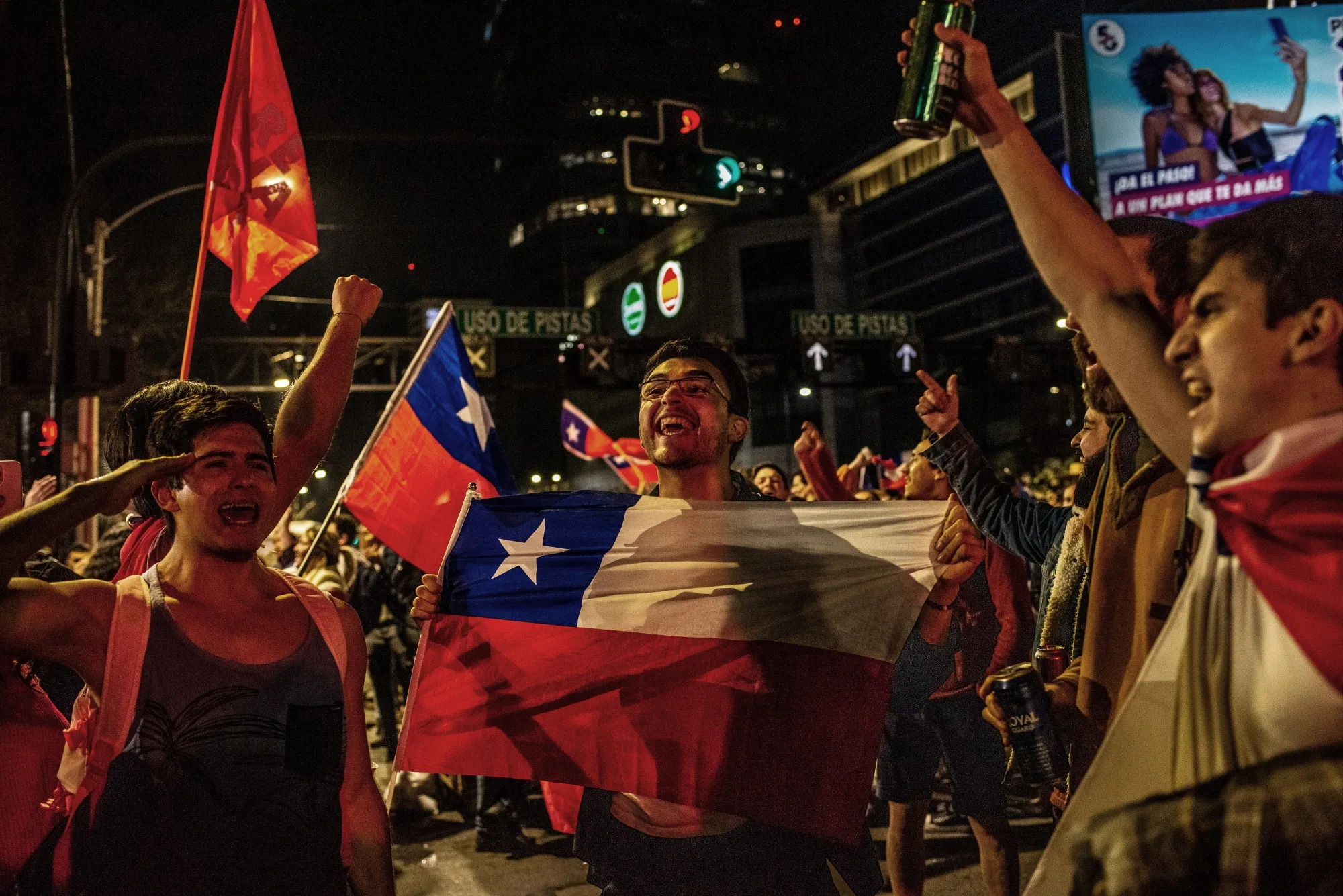 Opponents of the new constitution celebrate&nbsp;the referendum result&nbsp;in Santiago