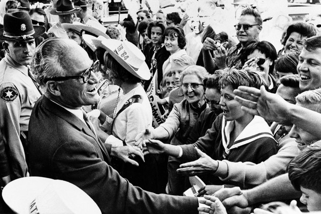 Republican presidential candidate Barry Goldwater greets supporters during a whistle-stop tour of Rock Island, Ill., on Oct. 3, 1964