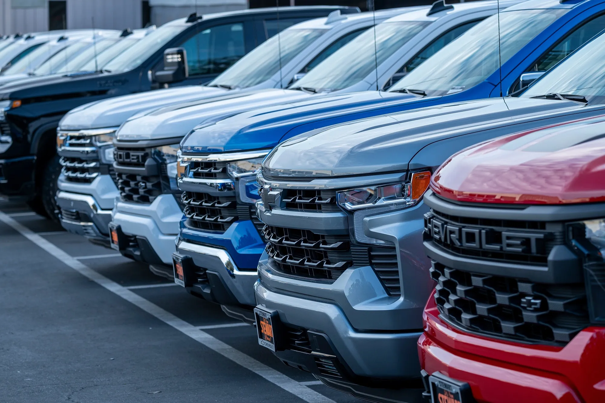 Chevrolet Silverado pick-up trucks at a dealership in Colma, California.