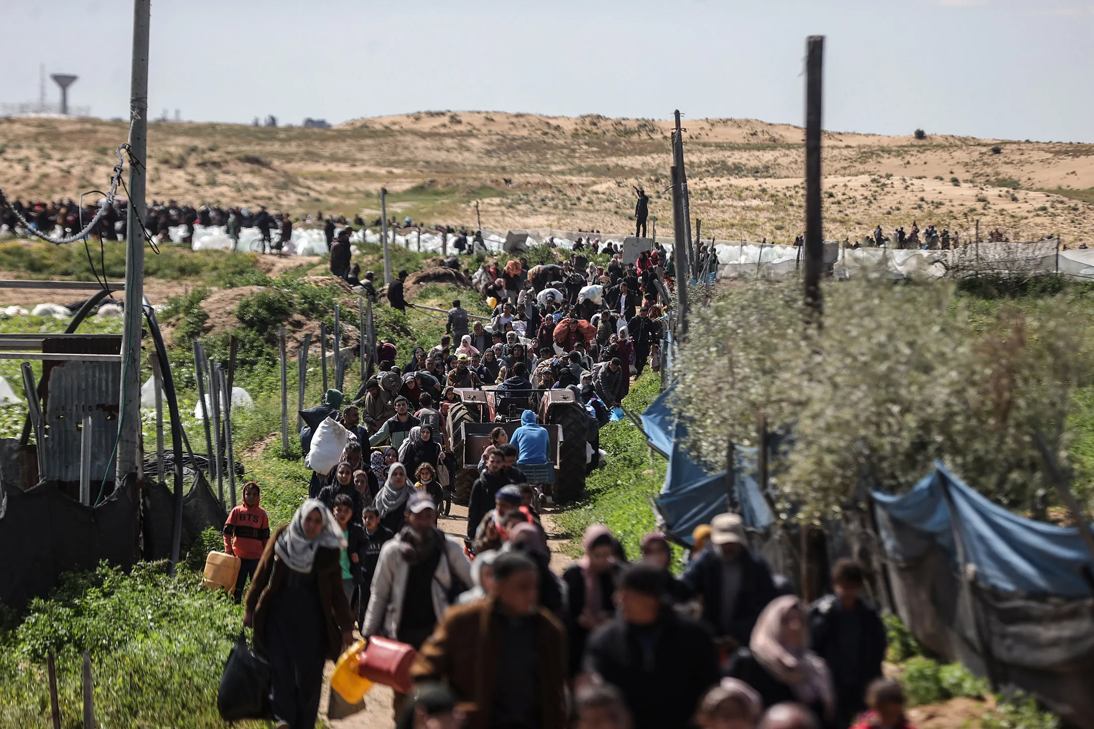 Palestinians flee to Khan Yunis as the Israeli army continues to push into Rafah, Gaza on March 23.