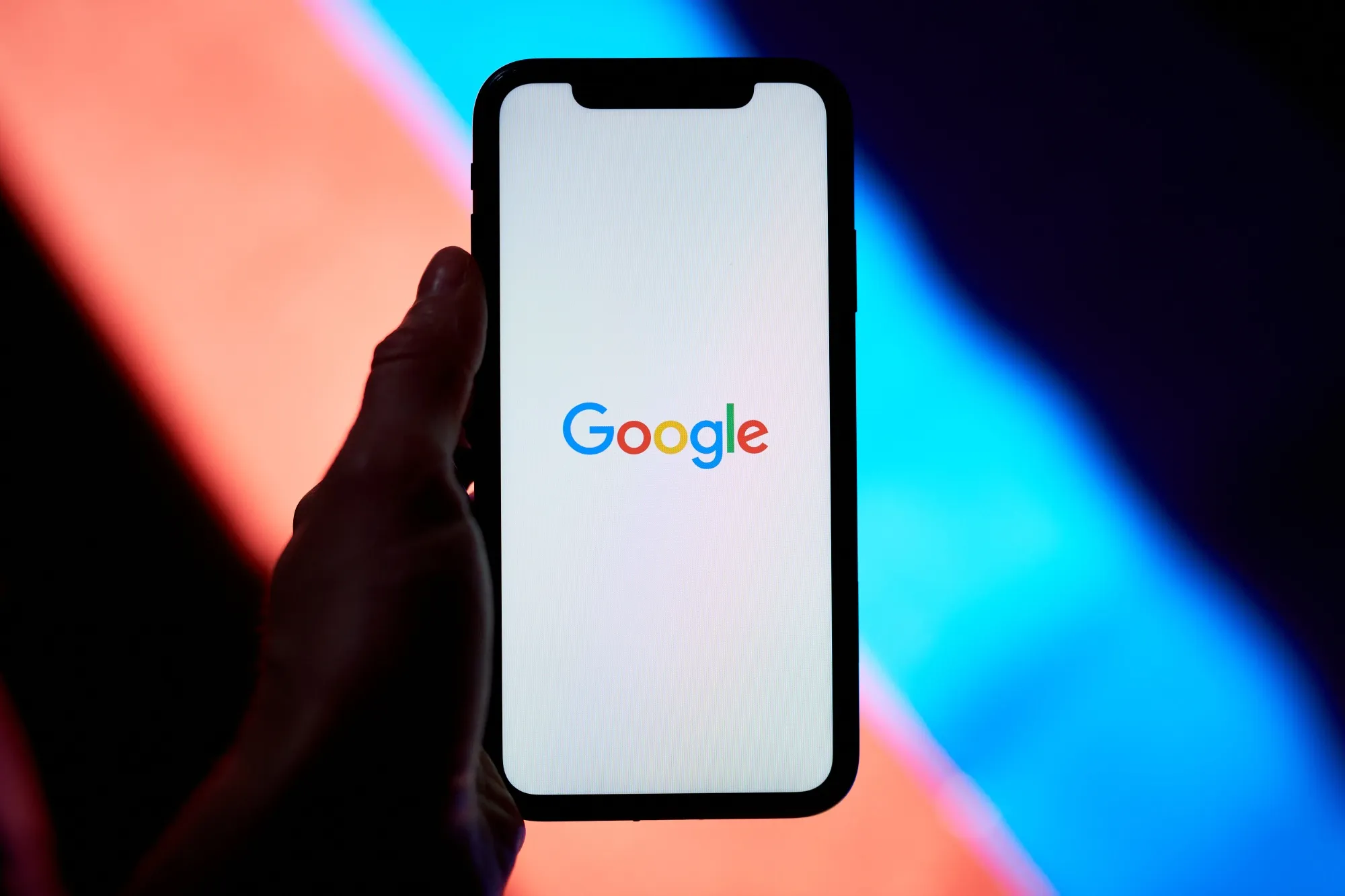 The Google logo on a smartphone.