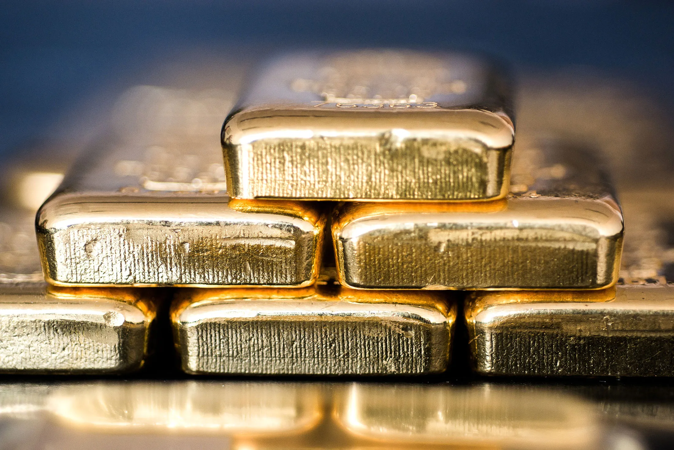 Gold bars sit stacked in this arranged photograph in Hungary.