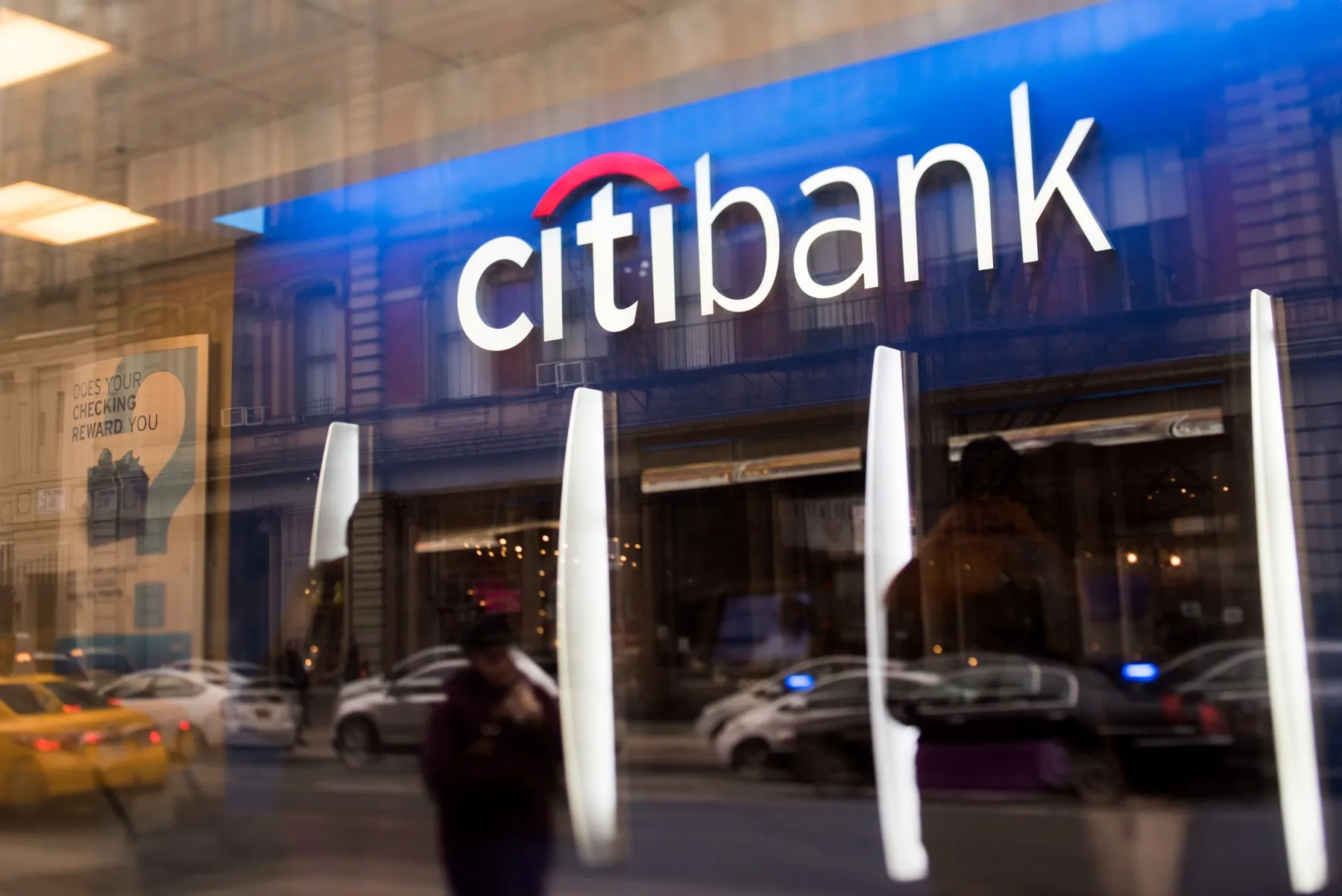 A customer uses an ATM at a Citibank&nbsp;branch in New York.