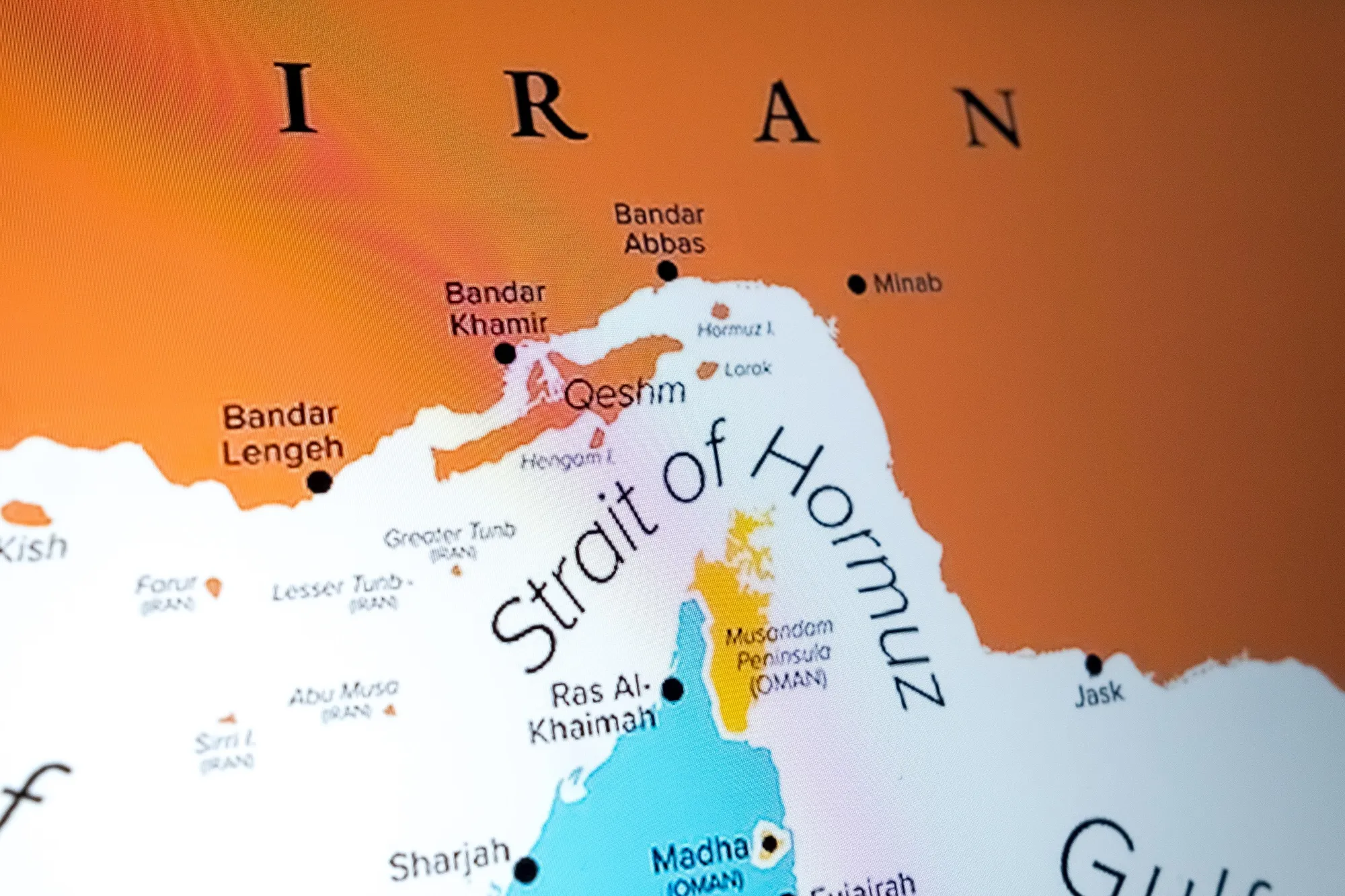 A map shows the Strait of Hormuz on a laptop computer screen.