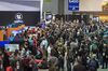 Attendees walk the floor at the Game Developers Conference in San Francisco, , March 2019.