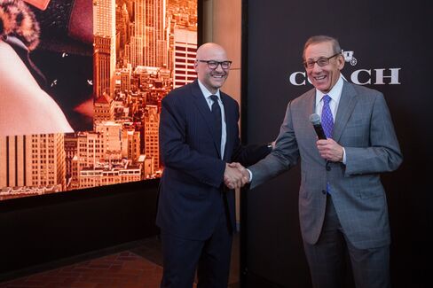 Luis, left, with Ross, at the opening.