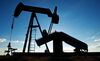 A pump jack operates in an oil field near Corpus Christi, Texas, U.S., on Thursday, Jan. 7, 2016. Crude oil slid Thursday to the lowest level since December 2003 as turbulence in China, the worlds biggest energy consumer, prompted concerns about the strength of demand.