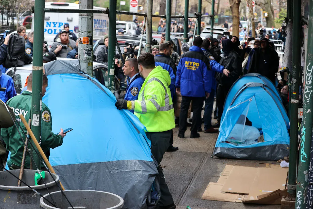 People are arrested during New York City's homeless encampment sweeps in the East Village neighborhood on April 6, 2022.&nbsp;
