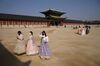 Tourists wear face masks outside Gyeongbokgung palace in Seoul on Feb. 10, 2020.