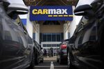 Customers shop for used vehicles at a CarMax dealership in Louisville, Kentucky.