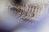 An engraving showing the headquarters of the Bank of England is seen on a British twenty pound banknote, in this arranged photograph in London, U.K., on Thursday, Oct. 13, 2016. The U.K. currency is getting harder to trade, and to predict, because the nation’s exit from the European Union has changed the rules of engagement.