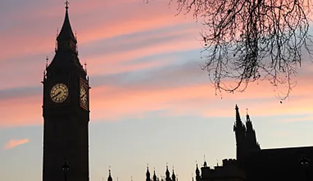 Elizabeth Tower, commonly referred to as Big Ben, stands as part of the Houses of Parliament as the sun rises, in London.