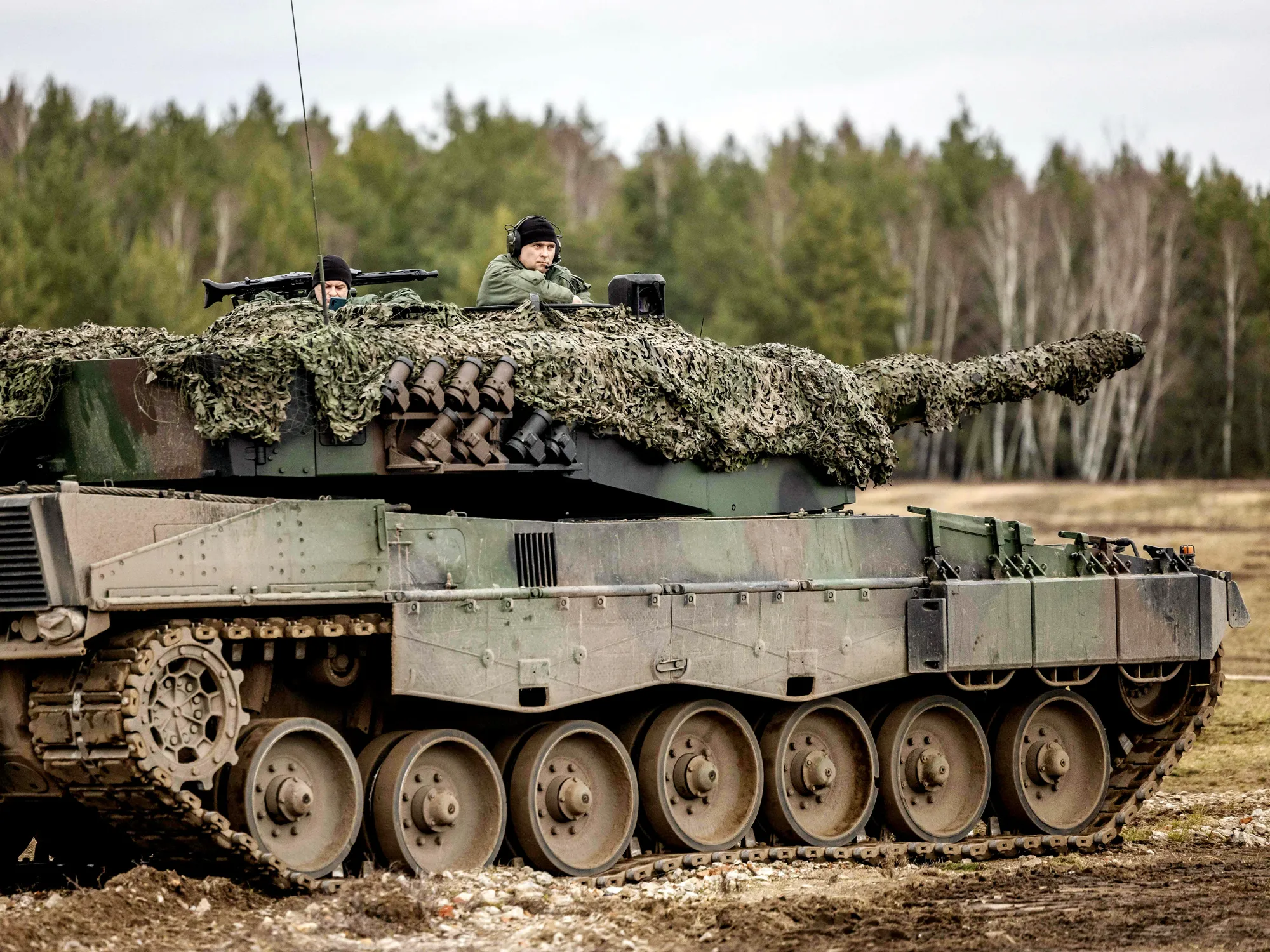 Polish and Ukrainian soldiers on a Leopard 2 A4 tank during training in Swietoszow, Poland.